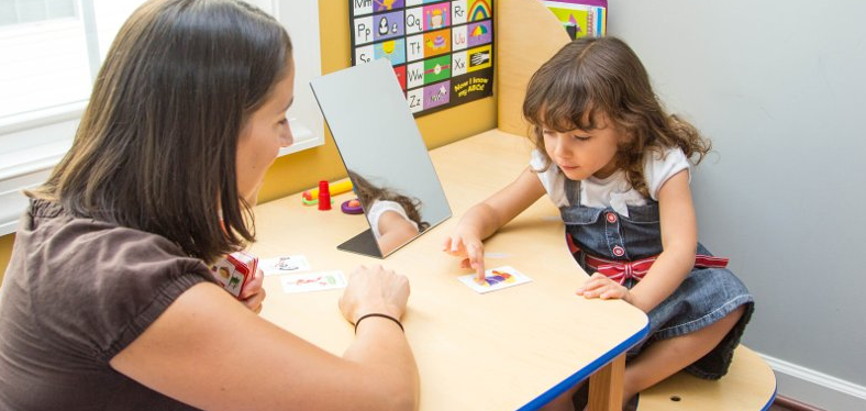 Image Small girl with teacher